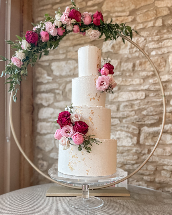 floral hoop finesses wedding cakes